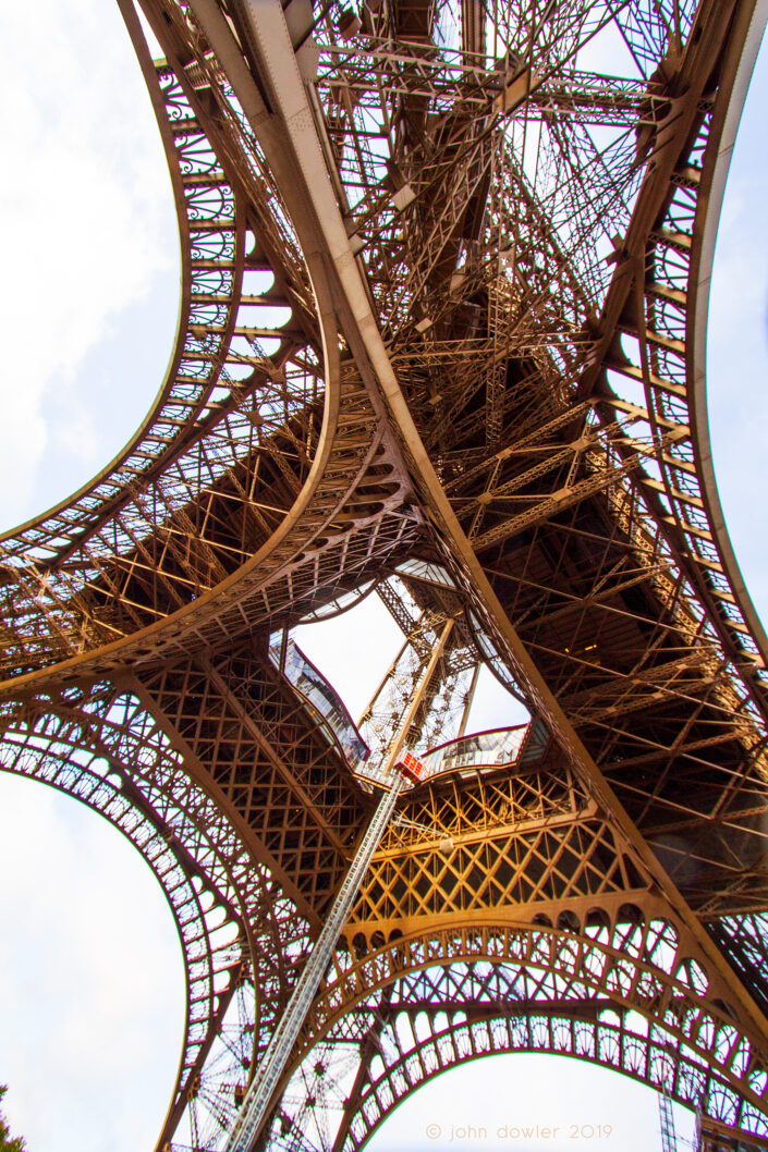 An angle on the Eiffel Tower from underneath.